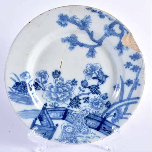 463 - AN UNUSUAL PAIR OF 18TH CENTURY DELFT TIN GLAZED POTTERY BOTANICAL PLATES together with two others. ... 