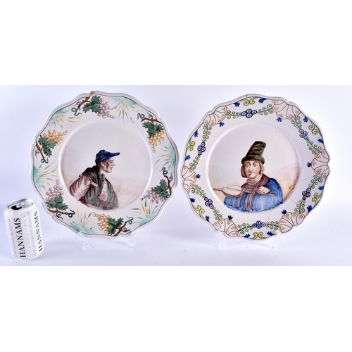 465 - A PAIR OF ANTIQUE FRENCH TIN GLAZED FAIENCE SCALLOPED PLATES painted with figures and foliage. 29 cm... 