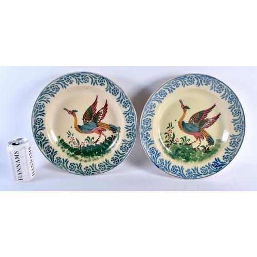 466 - A PAIR OF ANTIQUE FRENCH TIN GLAZED SPONGE DECORATED BIRD DISHES. 29 cm diameter.