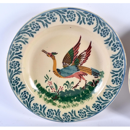 466 - A PAIR OF ANTIQUE FRENCH TIN GLAZED SPONGE DECORATED BIRD DISHES. 29 cm diameter.