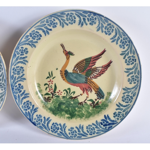 466 - A PAIR OF ANTIQUE FRENCH TIN GLAZED SPONGE DECORATED BIRD DISHES. 29 cm diameter.