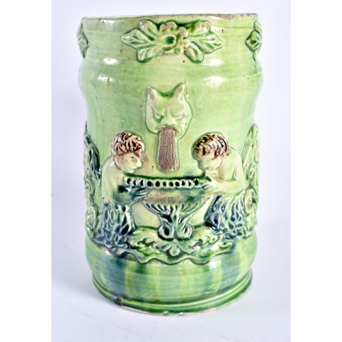 470 - A RARE ANTIQUE GREEN GLAZED WHIELDON TYPE MAJOLICA MUG decorated in relief with figures. 14 cm x 12 ... 