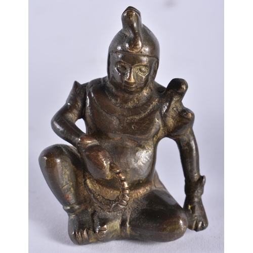 479 - TWO 19TH CENTURY INDIAN BRONZE FIGURES one modelled as the butter thief, the other as a seated male.... 