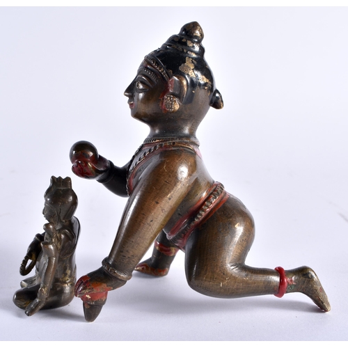 479 - TWO 19TH CENTURY INDIAN BRONZE FIGURES one modelled as the butter thief, the other as a seated male.... 