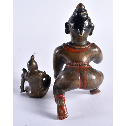 479 - TWO 19TH CENTURY INDIAN BRONZE FIGURES one modelled as the butter thief, the other as a seated male.... 