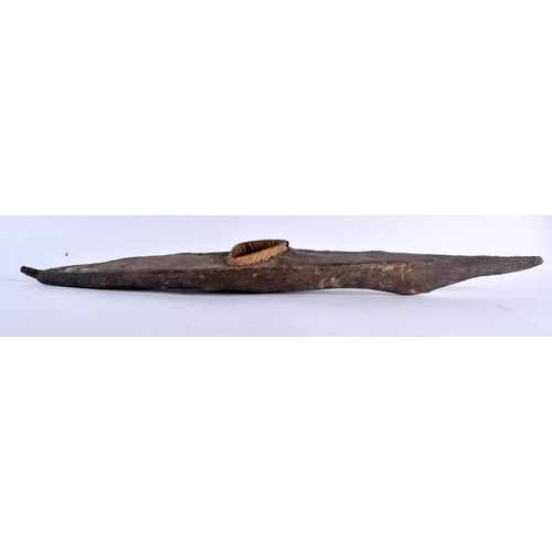 481 - AN EARLY NORTH AMERICAN SHARK/RAY SKIN SHAGREEN WRAPPED INUIT CANOE together with a carved Stone fig... 