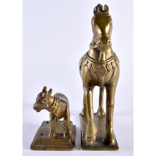 484 - AN 18TH CENTURY INDIAN BRONZE FIGURE OF A STANDING HORSE together with a smaller bronze Nandi bull. ... 