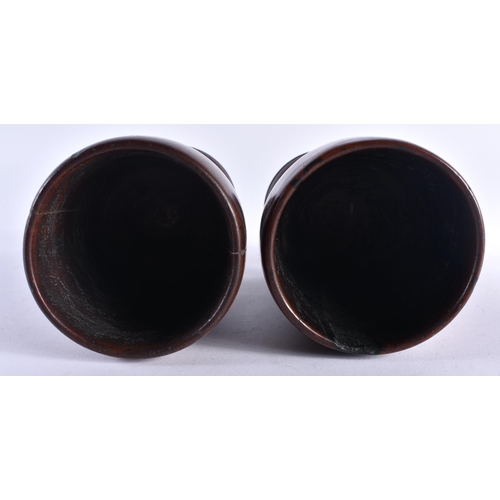 485 - A PAIR OF ANTIQUE TREEN WOOD GOBLETS. 15 cm x 7 cm.