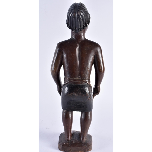 487 - AN AFRICAN TRIBAL CARVED WOOD FIGURE OF A MUSICIAN with painted features. 36 cm high.