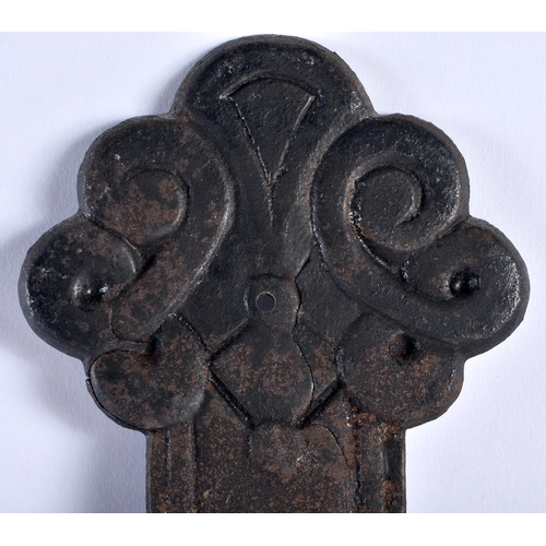 491 - AN ARTS AND CRAFTS CAST SHEET IRON CRUCIFIX formed with floral motifs. 45 cm x 27 cm.