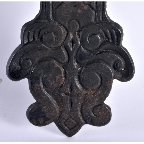 491 - AN ARTS AND CRAFTS CAST SHEET IRON CRUCIFIX formed with floral motifs. 45 cm x 27 cm.