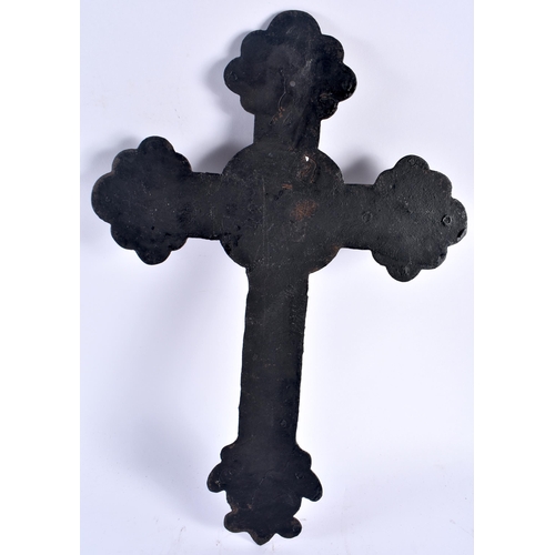 491 - AN ARTS AND CRAFTS CAST SHEET IRON CRUCIFIX formed with floral motifs. 45 cm x 27 cm.