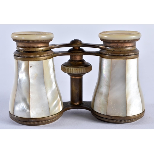 493 - A PAIR OF MOTHER OF PEARL OPERA GLASSES. 9 cm x 8 cm extended.