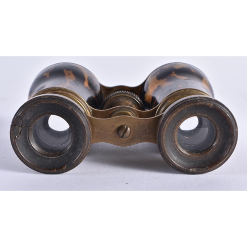 496 - A PAIR OF TORTOISESHELL OPERA GLASSES. 8 cm x 5 cm extended.