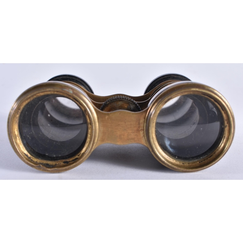 496 - A PAIR OF TORTOISESHELL OPERA GLASSES. 8 cm x 5 cm extended.