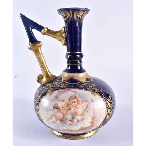 497 - A RARE HUNGARIAN FISCHER BUDAPEST PORCELAIN JUG painted with putti. 19 cm x 12 cm.