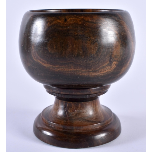 503 - AN ANTIQUE LIGNUM VITAE TABLE SALT. 11 cm x 9 cm.