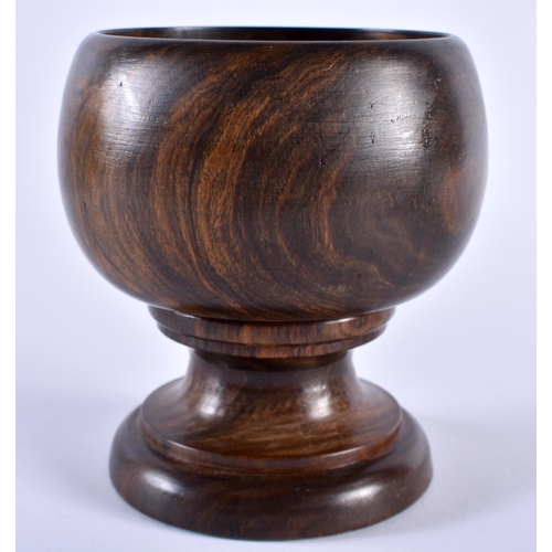 503 - AN ANTIQUE LIGNUM VITAE TABLE SALT. 11 cm x 9 cm.