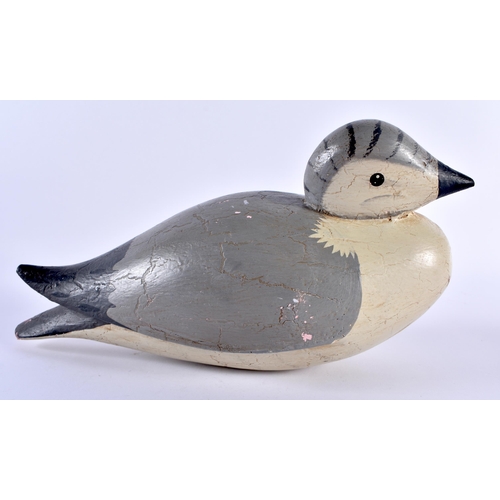 506 - A PAINTED WOOD FOLK ART DECOY DUCK. 22 cm wide.