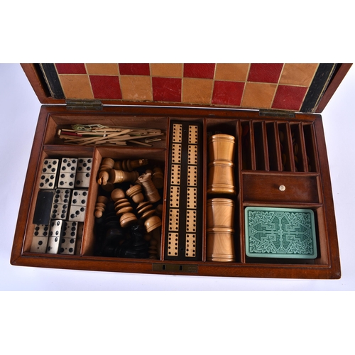 509 - AN ANTIQUE GAMING COMPENDIUM within original mahogany box. 38 cm x 24 cm.