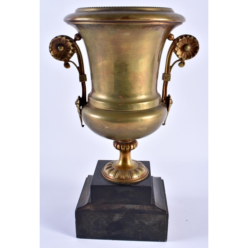 518 - A 19TH CENTURY FRENCH TWIN HANDLED BRONZE VASE upon a slate base. 29 cm high.