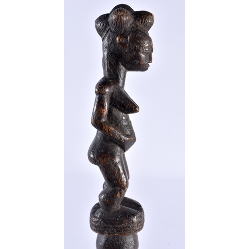 519 - AN AFRICAN TRIBAL CARVED WOOD STAFF. 45 cm long.