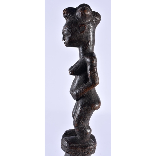 519 - AN AFRICAN TRIBAL CARVED WOOD STAFF. 45 cm long.