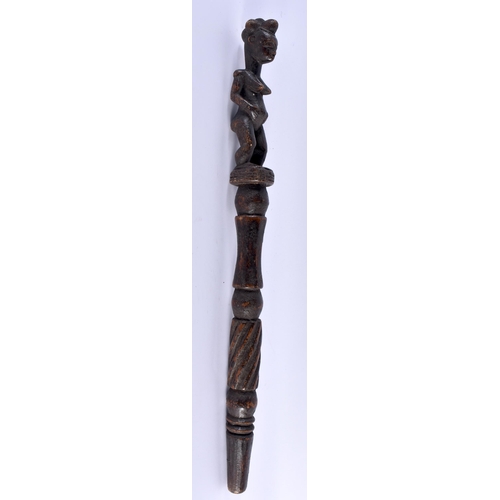 519 - AN AFRICAN TRIBAL CARVED WOOD STAFF. 45 cm long.