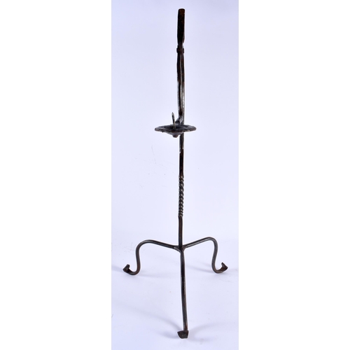 525 - AN ANTIQUE IRON RUSHNIP. 50 cm high.