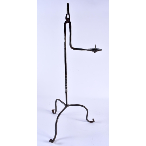 525 - AN ANTIQUE IRON RUSHNIP. 50 cm high.