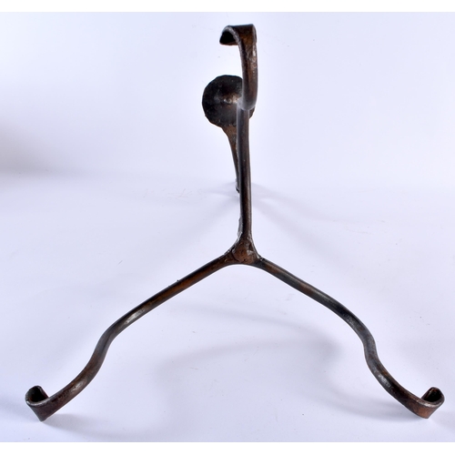 525 - AN ANTIQUE IRON RUSHNIP. 50 cm high.