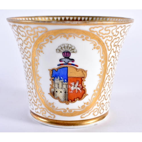 54 - A LATE 18TH/19TH CENTURY WORCESTER ARMORIAL PORCELAIN CUP AND SAUCER painted with seaweed motifs. 13... 