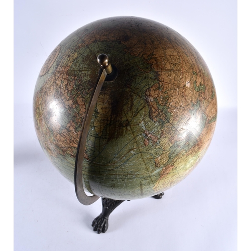 553 - A LARGE ANTIQUE W & A K JOHNSTONS 12 INCH TERRESTRIAL GLOBE upon a cast iron base. 54 cm x 24 cm.