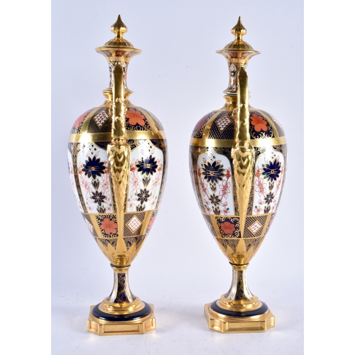 561 - A LOVELY LARGE PAIR OF ROYAL CROWN DERBY IMARI TWIN HANDLED PORCELAIN VASES. 42 cm x 14 cm.