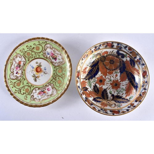 57 - TWO EARLY 19TH CENTURY CHAMBERLAINS WORCESTER CUPS AND SAUCERS one painted with imari foliage, the o... 
