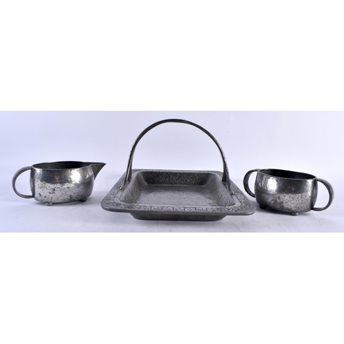 571 - AN ARTS AND CRAFTS HAMMERED PEWTER BASKET TRAY together with a Liberty & Co pewter sugar basin and m... 