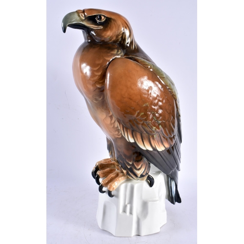 574 - A LARGE KARL ENS CONTINENTAL PORCELAIN FIGURE OF A HAWK. 46 cm x 18 cm.