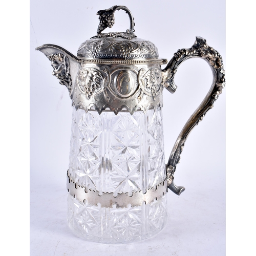 582 - A FINE LARGE VICTORIAN SILVER PLATED CUT GLASS CLARET JUG Attributed to Elkington & Co. 27 cm x 18 c... 