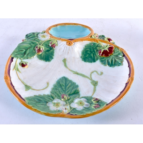 584 - A 19TH CENTURY STAFFORDSHIRE FIGURE OF THREE POODLES together with a Majolica dish in the manner of ... 