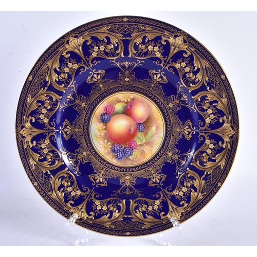 587 - A FINE ROYAL WORCESTER RAISED GILT PORCELAIN FRUIT PAINTED PLATE by Leaman. 26 cm diameter.