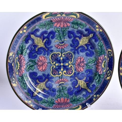 591 - FOUR LARGE UNUSUAL ROYAL DOULTON ARTS AND CRAFTS STYLE PLATES. 26 cm diameter. (4)