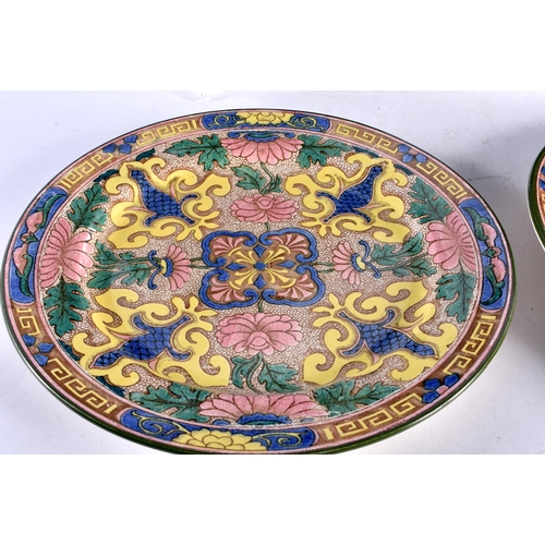 591 - FOUR LARGE UNUSUAL ROYAL DOULTON ARTS AND CRAFTS STYLE PLATES. 26 cm diameter. (4)