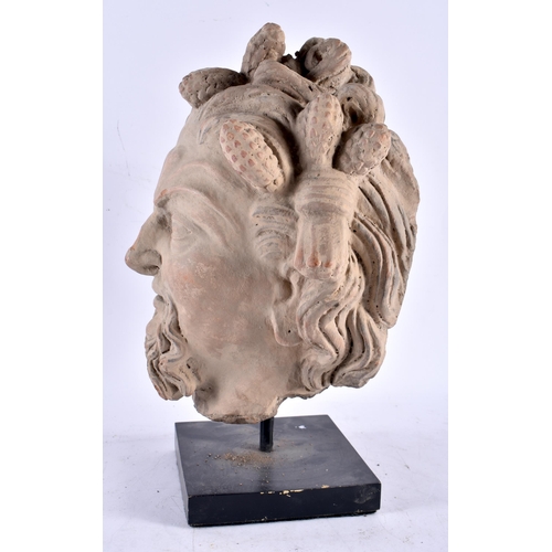 604 - A SOUTHERN EUROPEAN CARVED STONE HEAD OF A BEARDED MALE possibly Early Roman or Greek. Head 28 cm x ... 