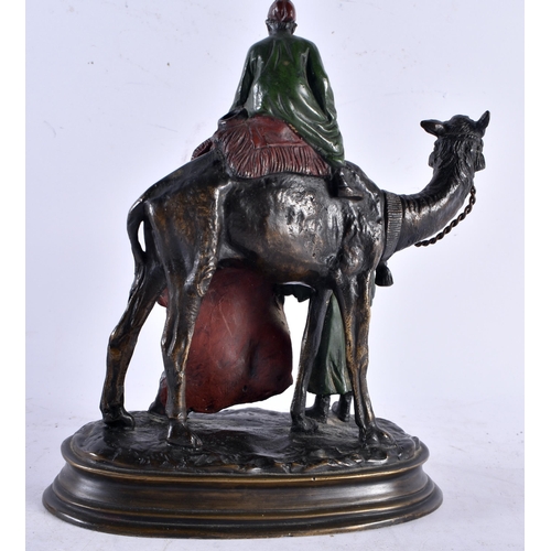 611 - After Carl Kauba (20th Century) Cold painted bronze, Two figures upon a camel. 21 cm x 16 cm.