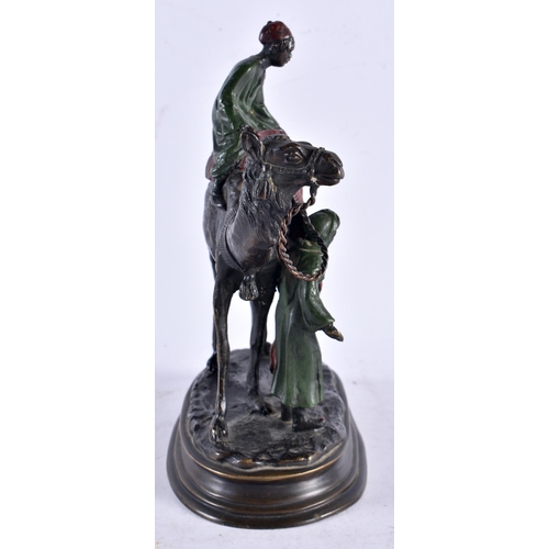 611 - After Carl Kauba (20th Century) Cold painted bronze, Two figures upon a camel. 21 cm x 16 cm.