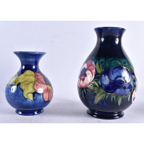 614 - TWO MOORCROFT VASES. Largest 18.5 cm high. (2)