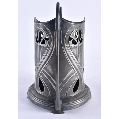 627 - AN ART NOUVEAU WMF PEWTER BOTTLE HOLDER. 21 cm x 18 cm.