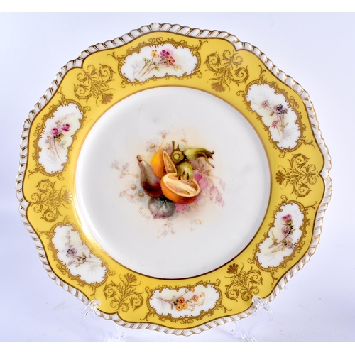 63 - A PAIR OF ROYAL WORCESTER SCALLOPED PORCELAIN CABINET PLATES painted with still lives under a canary... 