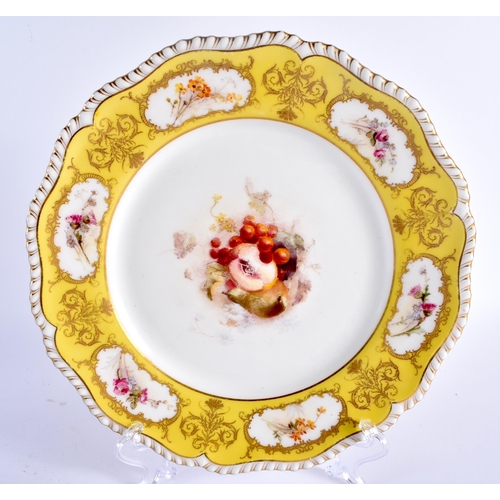 63 - A PAIR OF ROYAL WORCESTER SCALLOPED PORCELAIN CABINET PLATES painted with still lives under a canary... 