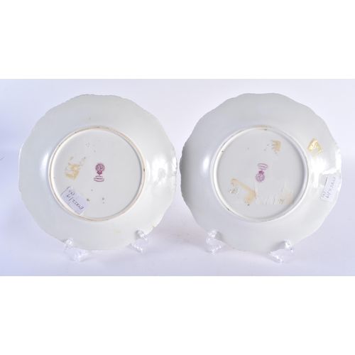 63 - A PAIR OF ROYAL WORCESTER SCALLOPED PORCELAIN CABINET PLATES painted with still lives under a canary... 